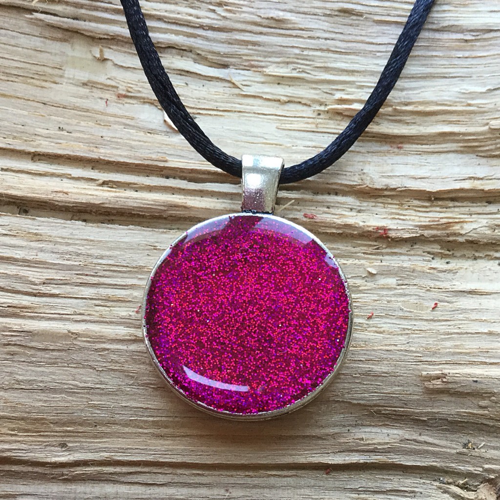 Ref: TP05 - Pink sparkle covered in glitter on silver pendant.