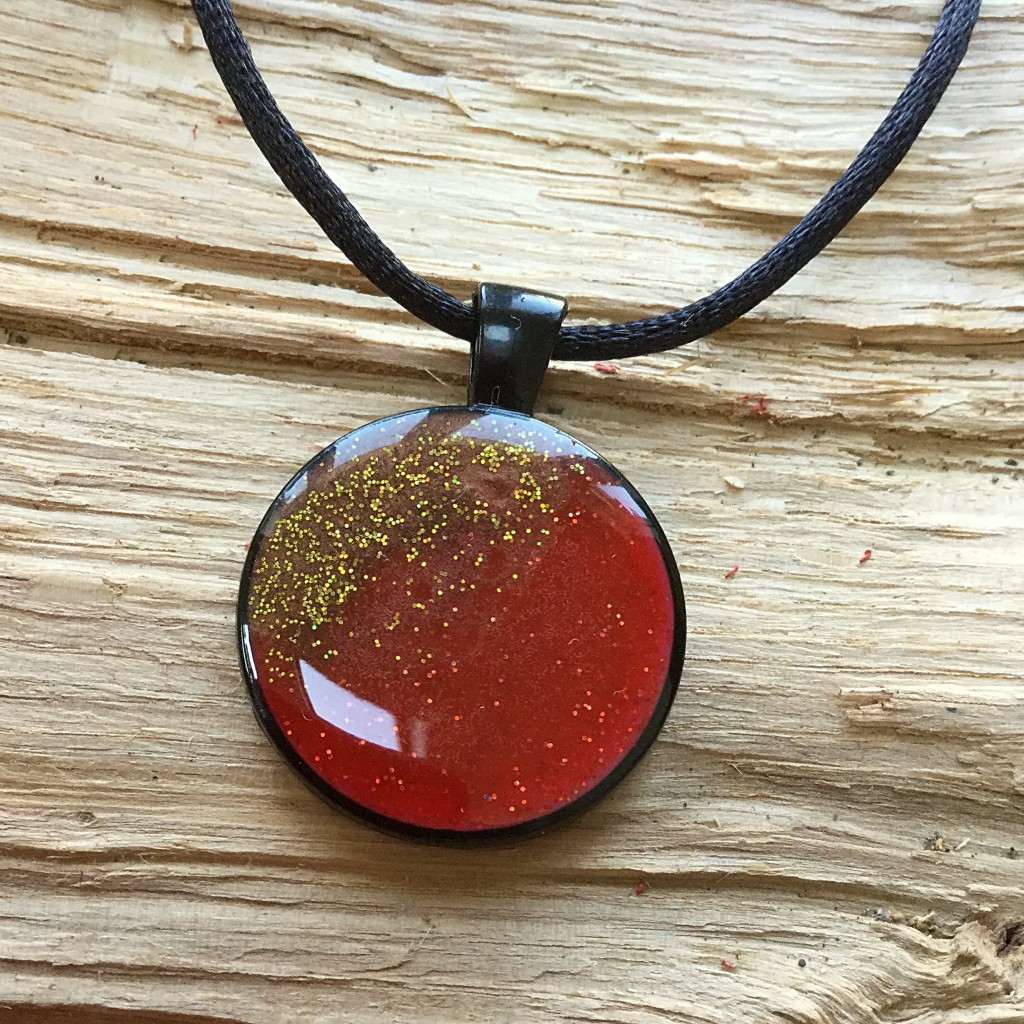 REF: TP03 - Red and gold with glitter on black pendant.